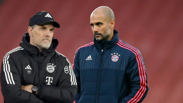 Guardiola y Tuchel, ambos con el buzo del Bayern Múnich como DT.