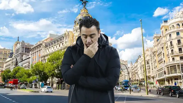 Xavi preocupado, Madrid de fondo