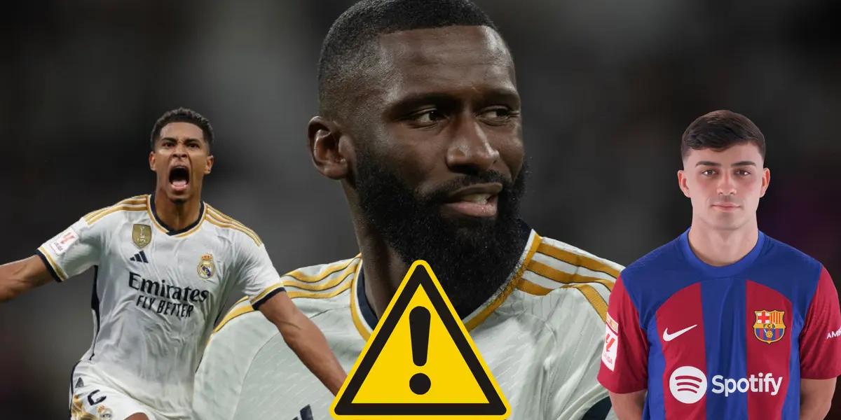 Antonio Rüdiger con la camiseta del Real Madrid. Jude Bellingham en un costado, Pedri del otro lado, señal de atención en medio