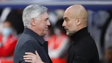 Carlo Ancelotti, entrenador del Real Madrid, con Pep Guardiola del Manchester City