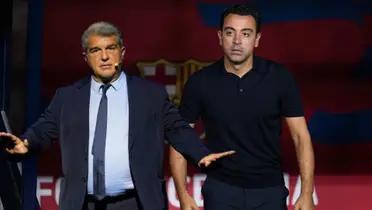 Joan Laporta y Xavi Hernández