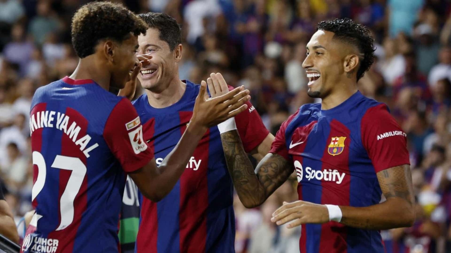 Lamine Yamal y Raphinha en el FC Barcelona, celebrando un gol