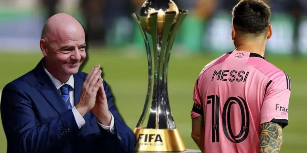 Lionel Messi con el presidente de la FIFA y el trofeo del Mundial de Clubes