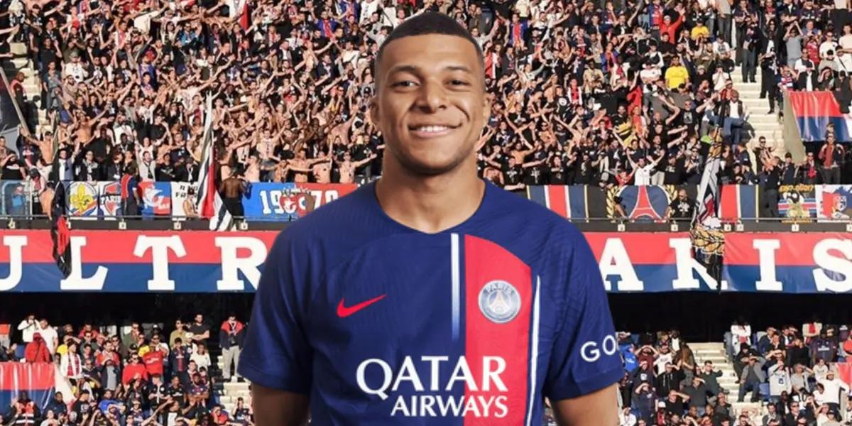 Mbappé con la camiseta del PSG, de fondo los hinchas parisinos.