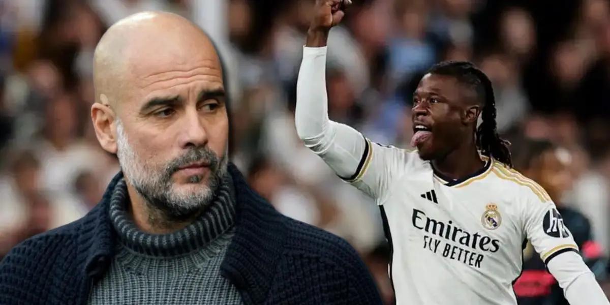 Pep Guardiola, entrenador del Manchester City, con Eduardo Camavinga del Real Madrid