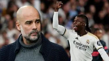 Pep Guardiola, entrenador del Manchester City, con Eduardo Camavinga del Real Madrid