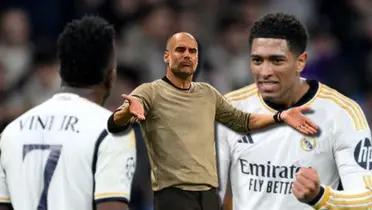 Pep Guardiola, entrenador del Manchester City, con jugadores del Real Madrid