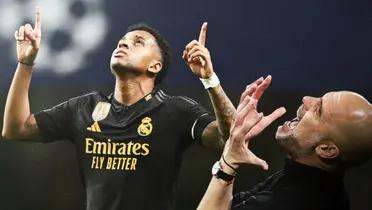 Rodrygo Goes, jugador del Real Madrid y Pep Guardiola, entrenador de Manchester City