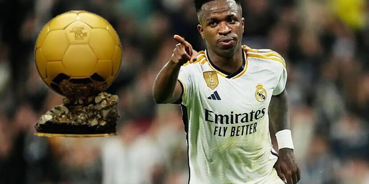 Vinicius con la camiseta del Real Madrid y el Balón de Oro.