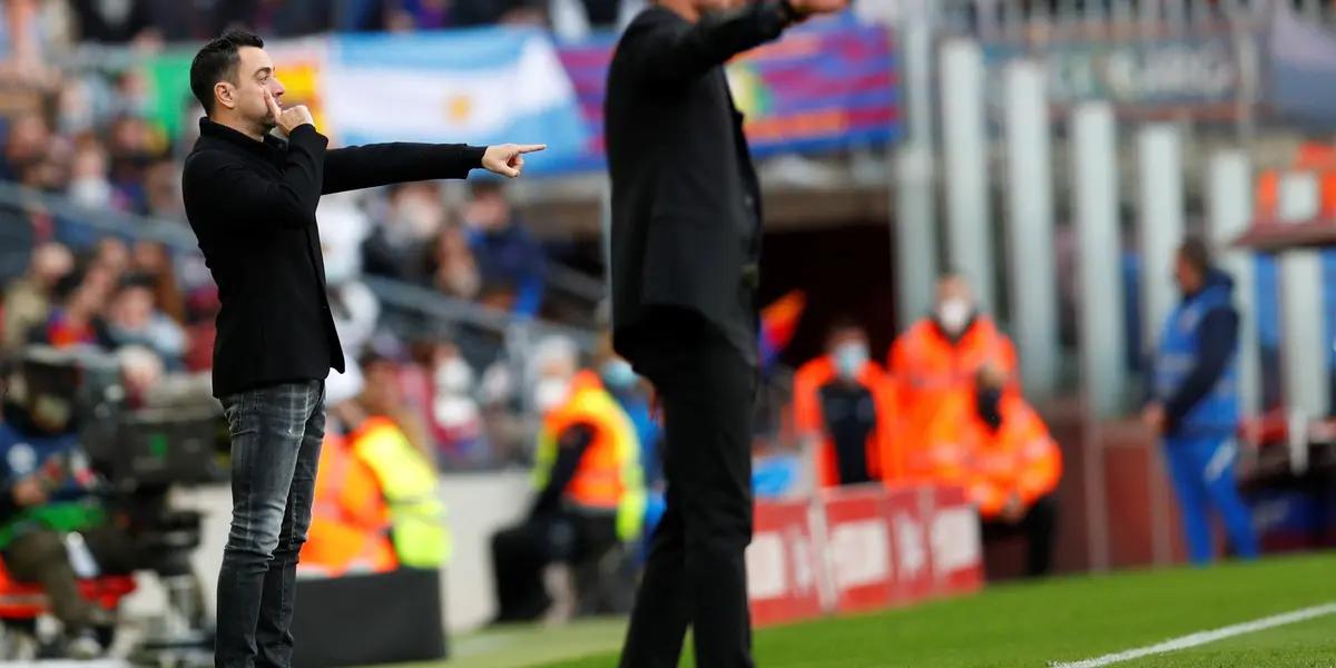 Xavi y Simeone en un Barça-Atlético